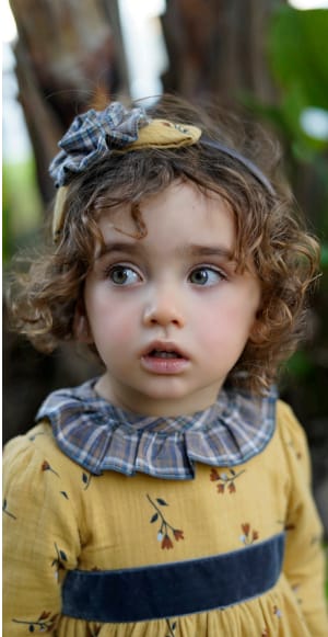 DBB Collection Invierno Jesusito bebé niña Mostaza Flores